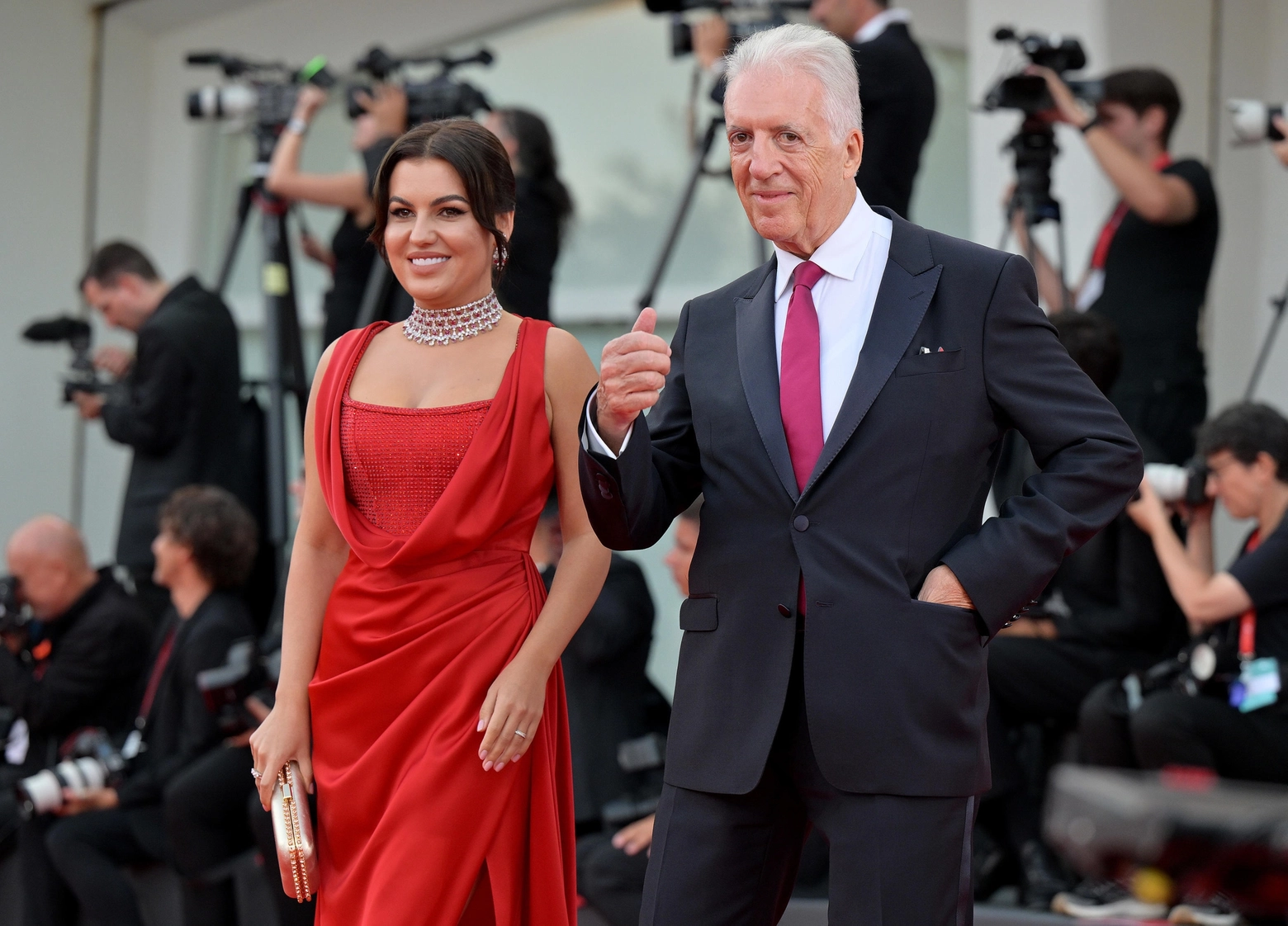 Italian businessman Piero Ferrari and his wife Romina Gingasu arrive for the premiere of 'Ferrari' during the 80th Venice Film Festival in Venice, Italy, 31 August 2023. The movie is presented in official competition 'Venezia 80' at the festival running from 30 August to 09 September 2023.  ANSA/ETTORE FERRARI