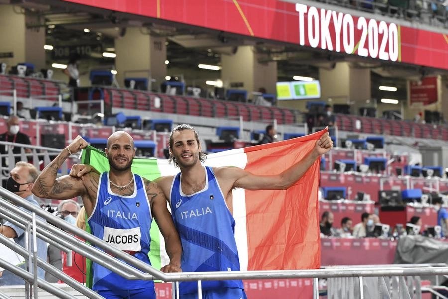 Italians Marcell Jacobs (L) and Gianmarco Tamberi celebrate after won respectively Men's 100 metres and Men's High Jump at Tokyo's Olympic Games 2020 Athletics event, Tokyo, Japan, 01 August 2021.  ANSA / CIRO FUSCO