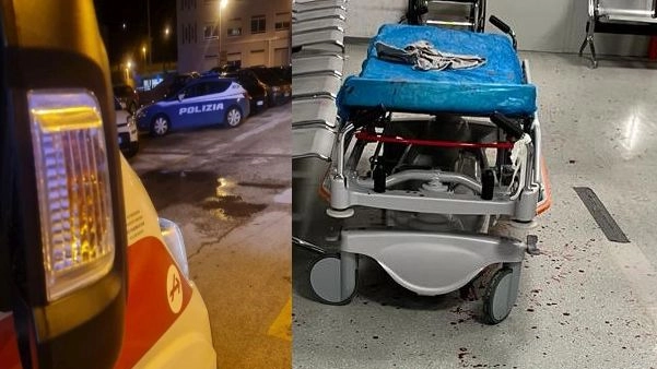 Terrore al pronto soccorso dell'ospedale Torrette di Ancona: a destra l'ingresso sporco di sangue e a sinistra le auto della polizia intervenute
