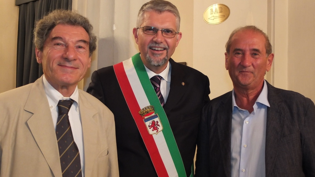 Il sindaco Giovanni Malpezzi con Nicolangelo Scianna e Aldo Fabbri