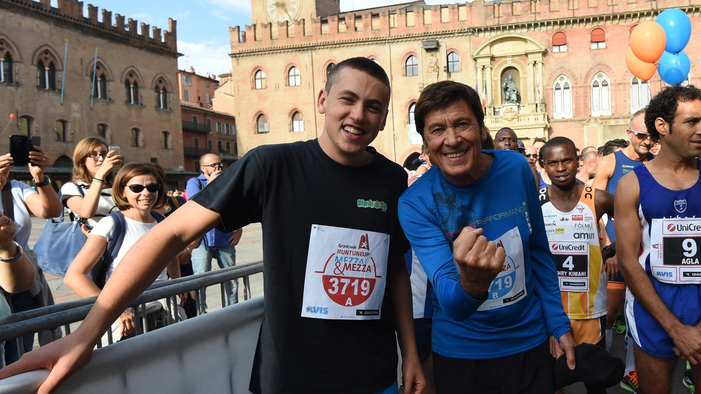 Gianni Morandi con il figlio Pietro alla 'Run Tune Up 2015' (Schicchi)