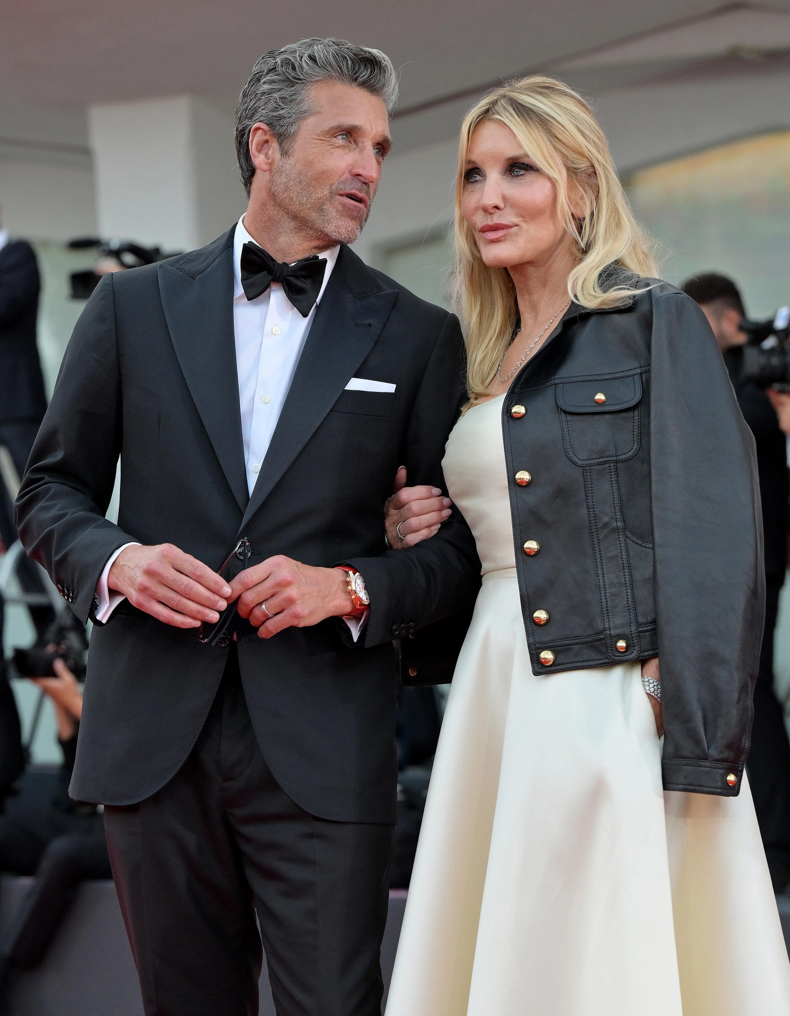 US actor Patrick Dempsey and his wife Jillian Fink arrive for the premiere of 'Ferrari' during the 80th Venice Film Festival in Venice, Italy, 31 August 2023. The movie is presented in official competition 'Venezia 80' at the festival running from 30 August to 09 September 2023.  ANSA/ETTORE FERRARI