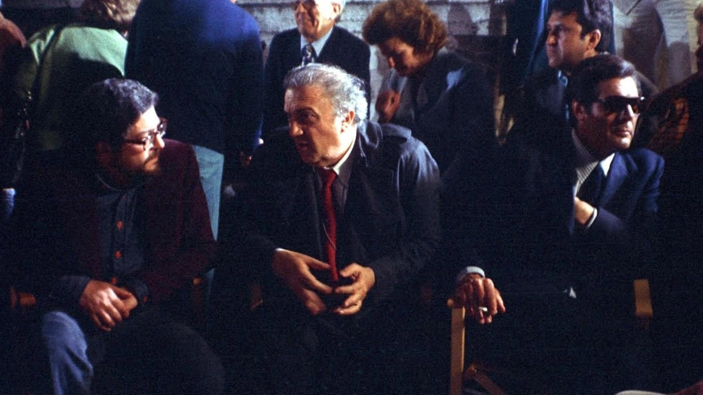 Scola e Mastroianni con Federico Fellini in una delle foto in mostra