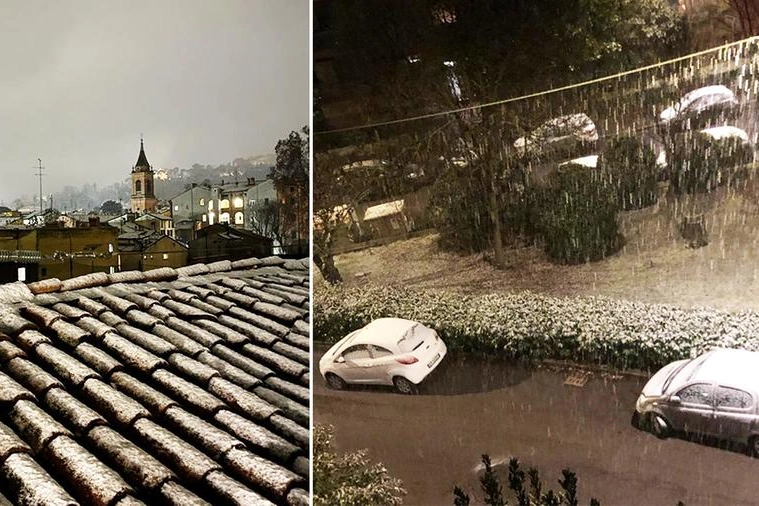 Una veduta dei tetti in Saragozza e, a destra, neve in via Toscana alta