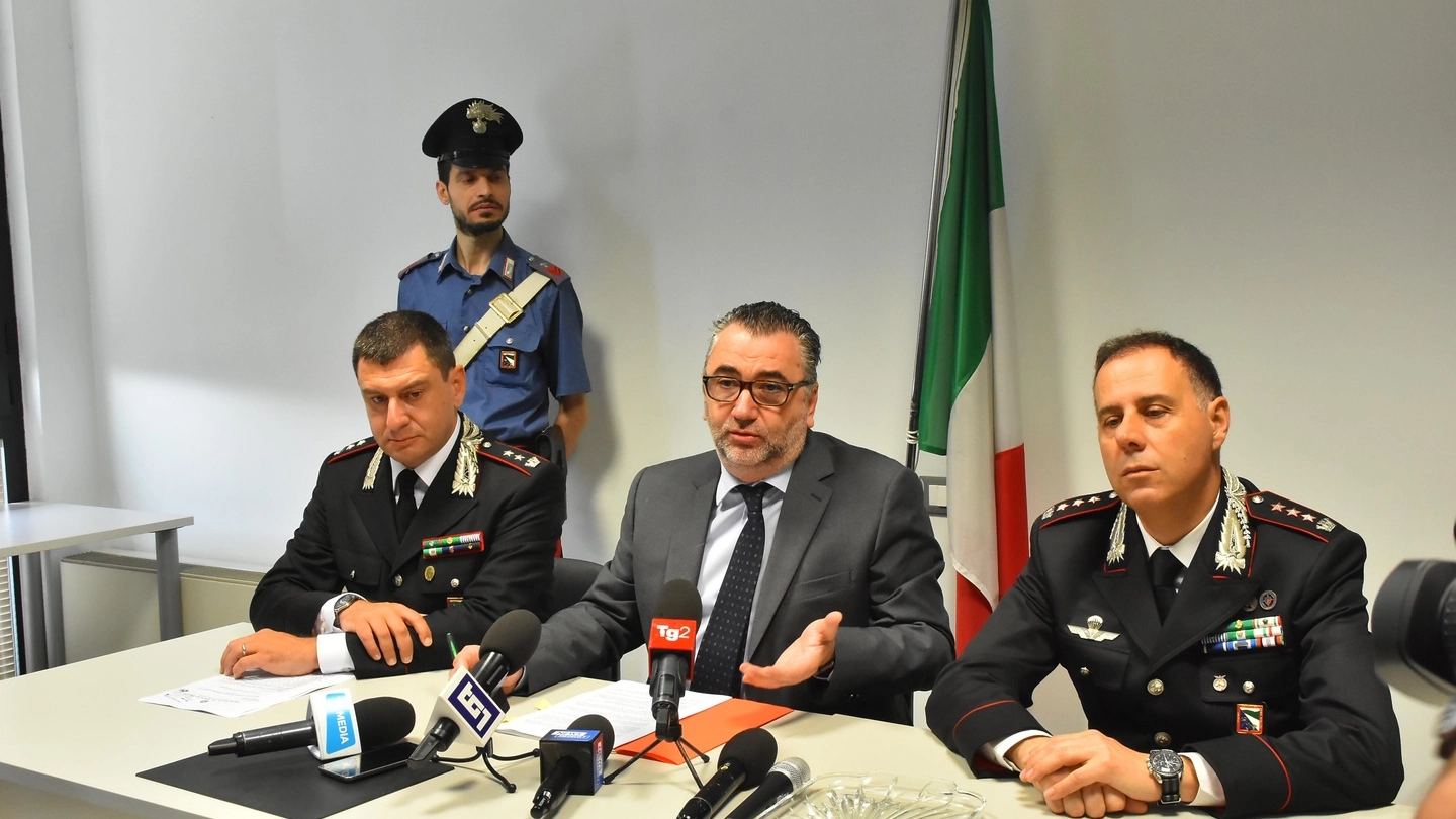 Al centro, il procuratore capo di Reggio Emilia Marco Mescolini (Foto Artioli)
