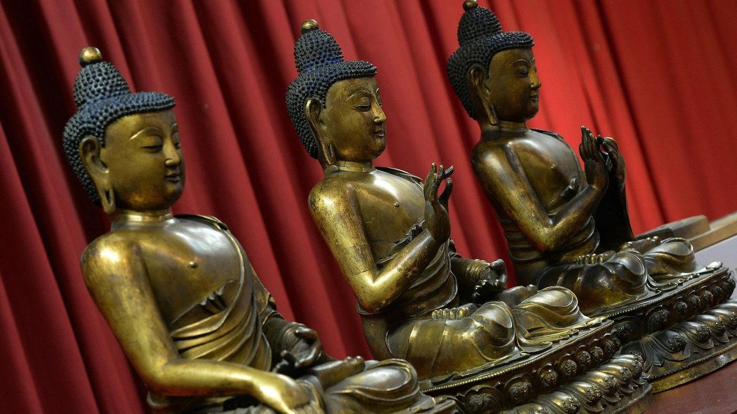 Tre sculture buddiste (Afp)