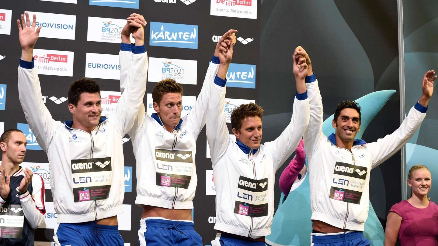 Orsi, Dotto, Leonardi e Magnini festeggiano il bronzo nella staffetta 4x100 agli Europei di Berlino (Foto Afp)