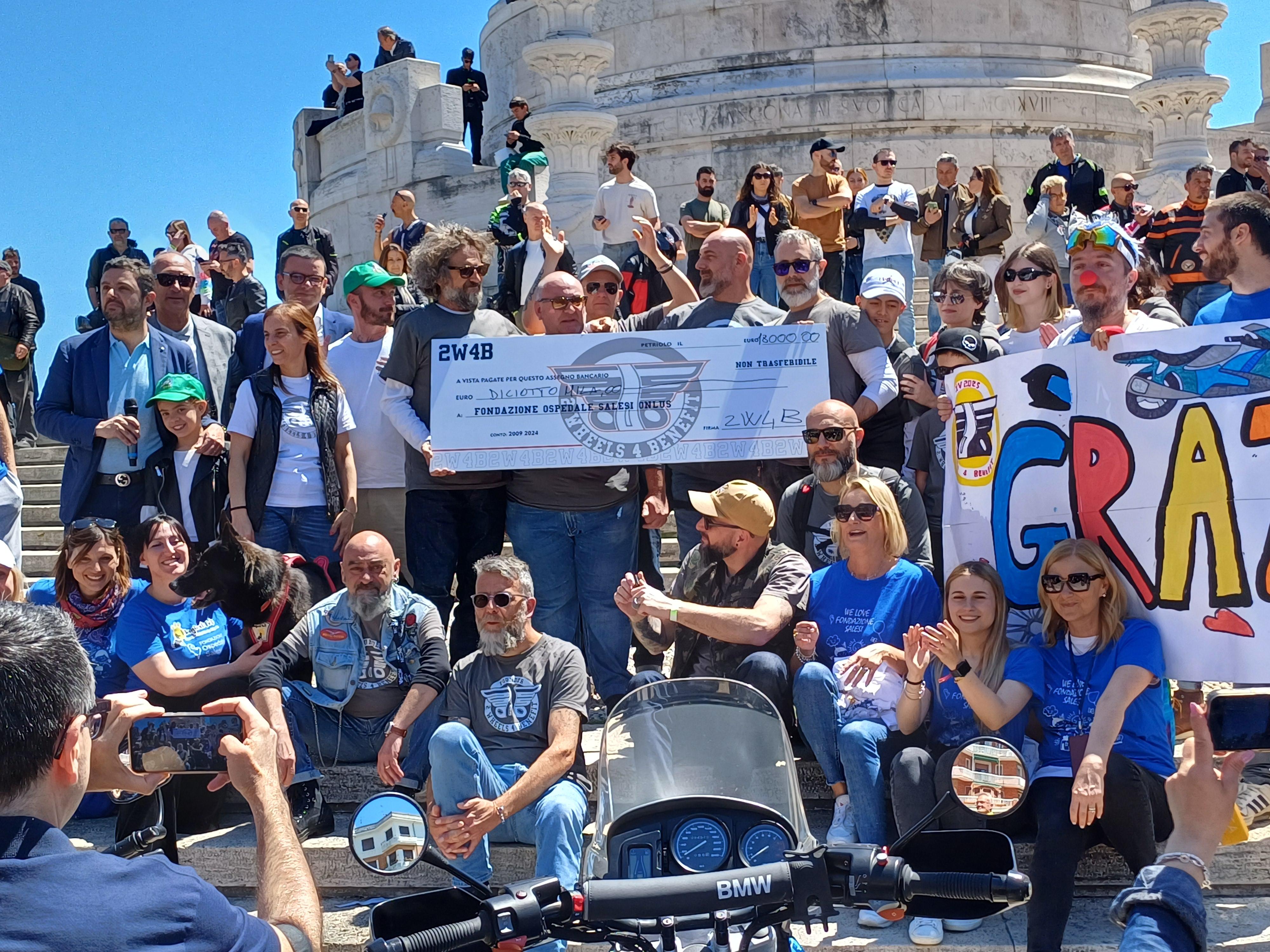 il grande cuore dei motociclisti donazione record per i bambini del salesi