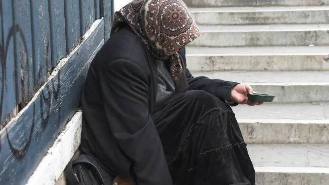 A beggar in Venice.