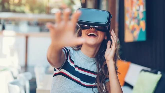 Young woman with virtual reality headset visore
